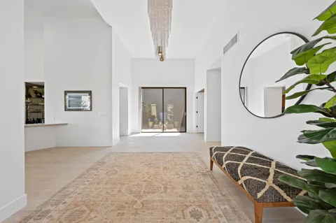 a view of a livingroom with furniture and windows