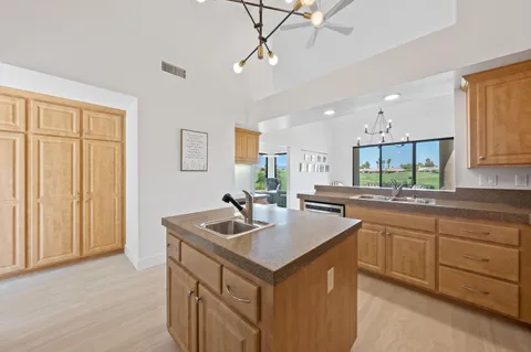 a bedroom with double bed and a couch