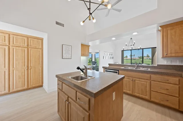 a bedroom with double bed and a couch