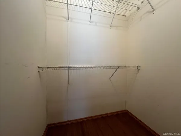 a view of a room with racks on the wall