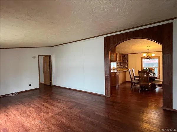 a view of livingroom with furniture and wooden floor