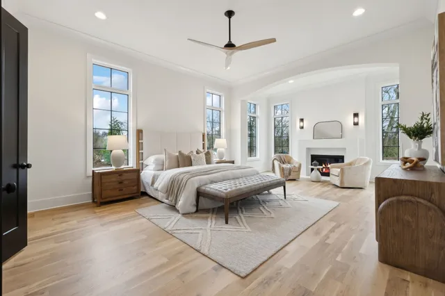 a kitchen with a sink and a mirror