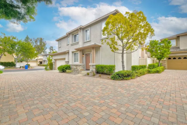 a view of a building with a garden