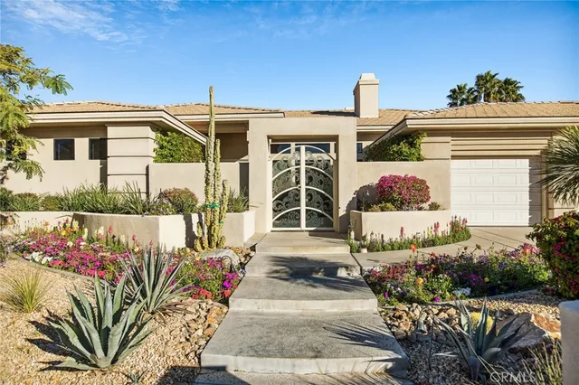 a outdoor living space with furniture and garden view