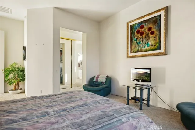 a kitchen with a sink stove and a refrigerator