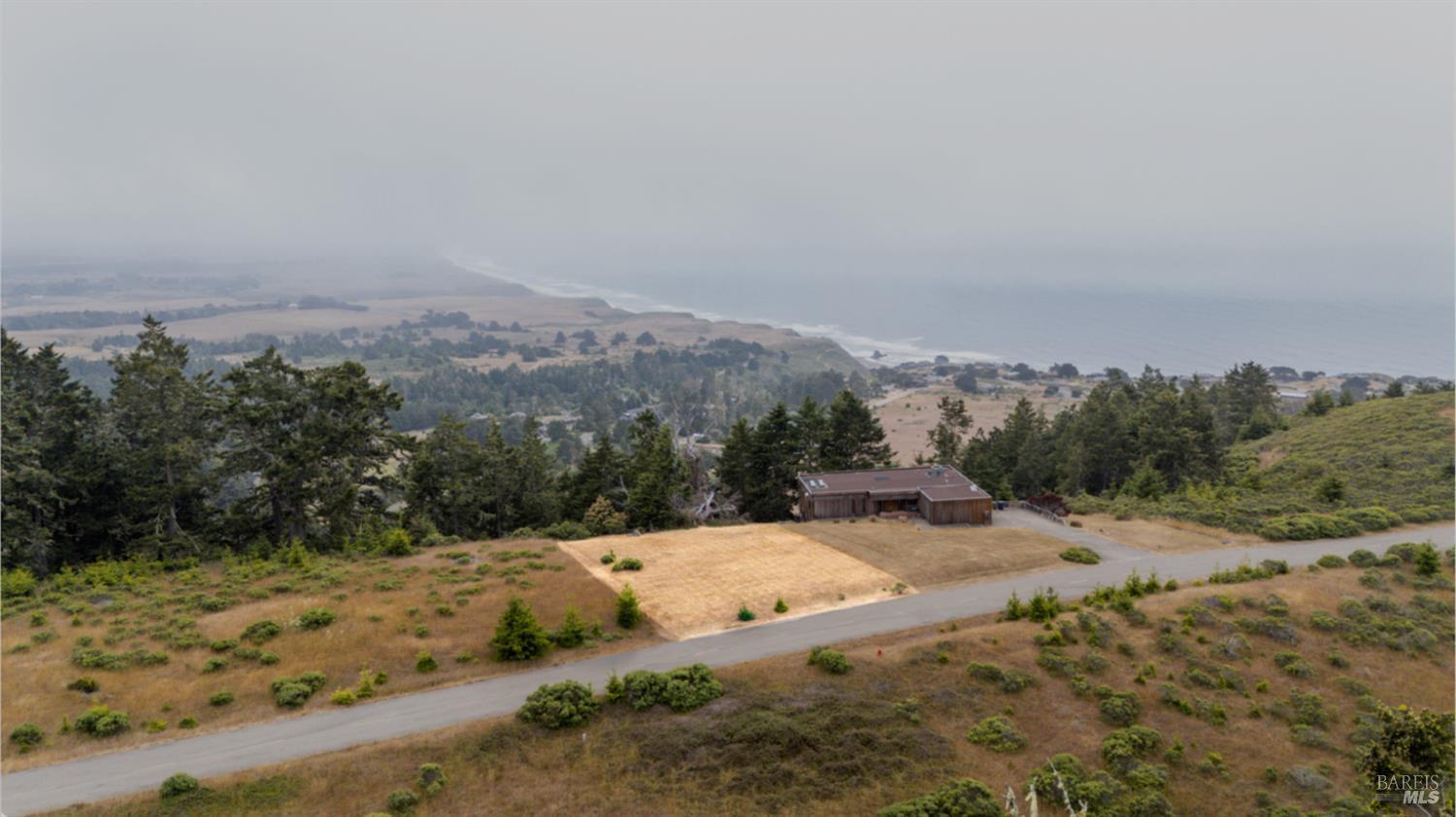 a view of a road with a yard