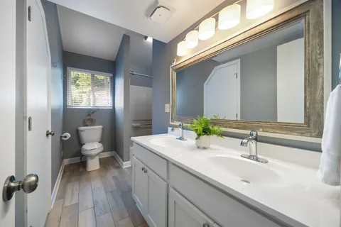 a bathroom with a sink and mirror