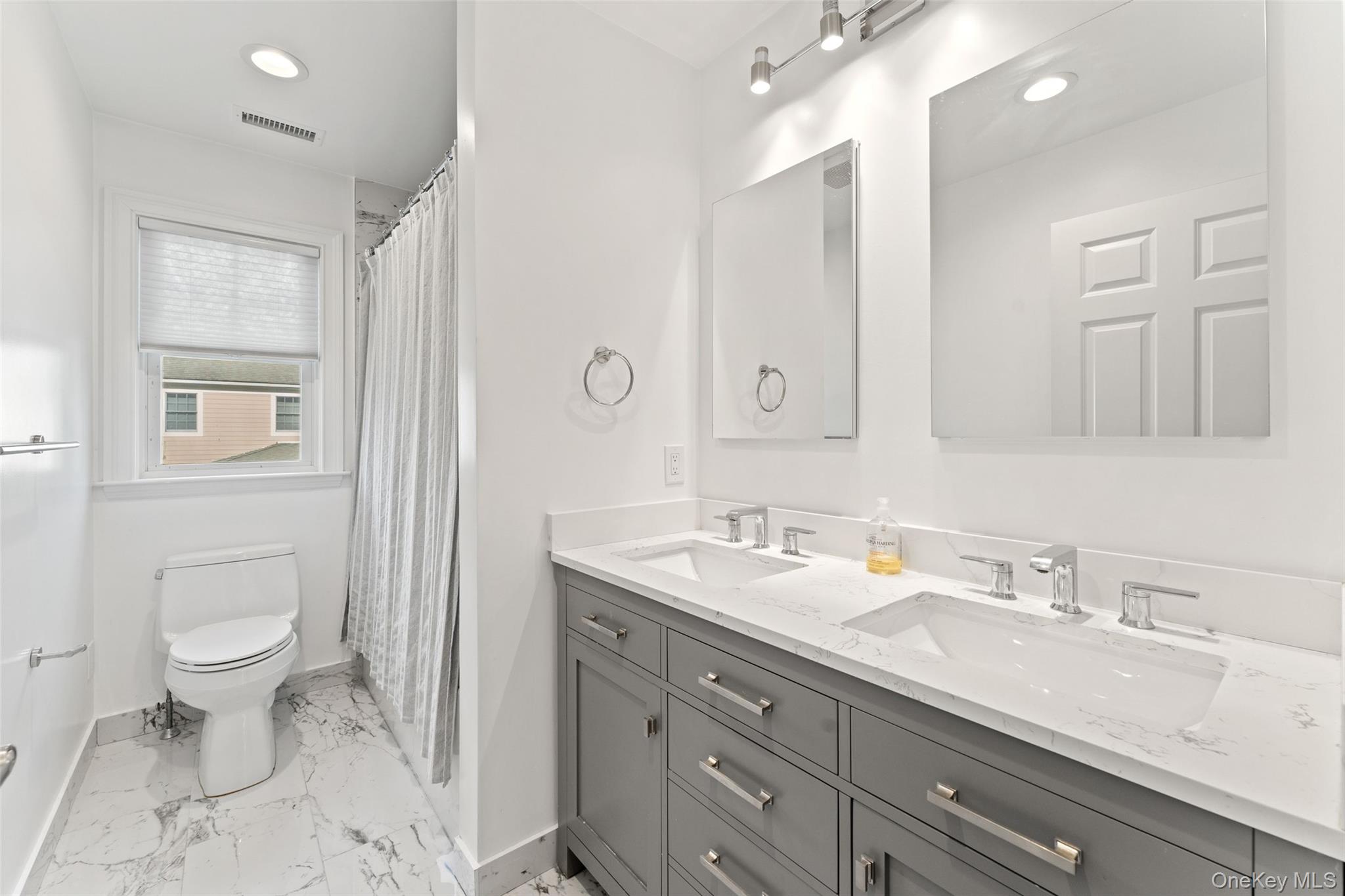 109 Lee Road Scarsdale, NY 10583 - Photo 23 of 33 Hall bath with double vanity