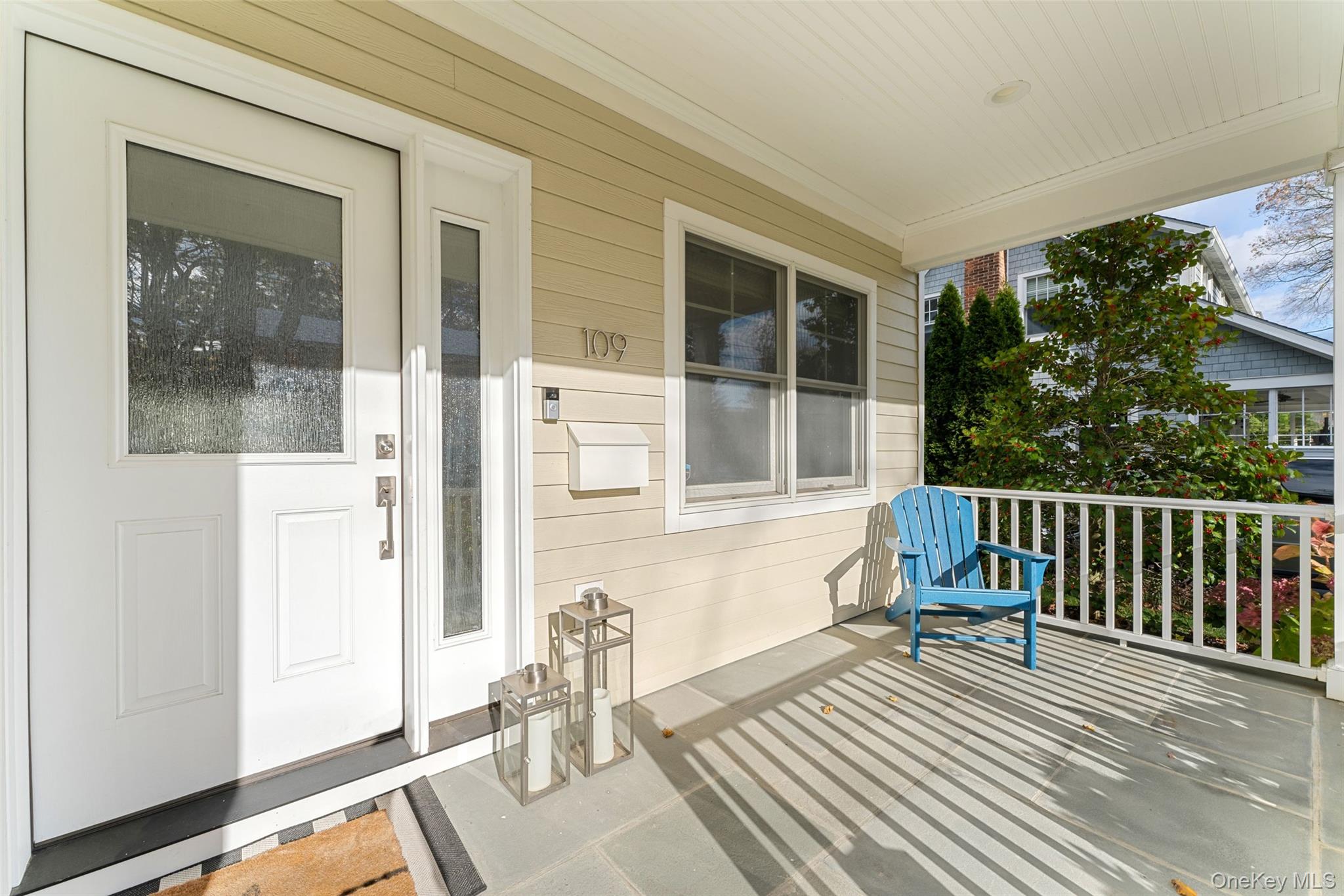 109 Lee Road Scarsdale, NY 10583 - Photo 3 of 33 The covered front porch welcomes you this gracious home