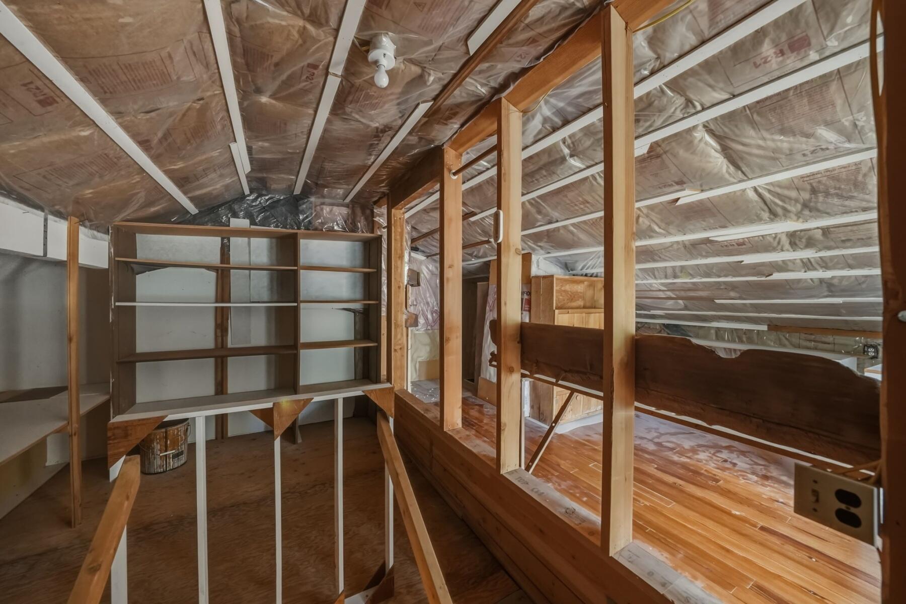 637 Northwest Silver Buckle Road Bend, OR 97703 - Photo 34 of 68 a view of an empty room with wooden floor