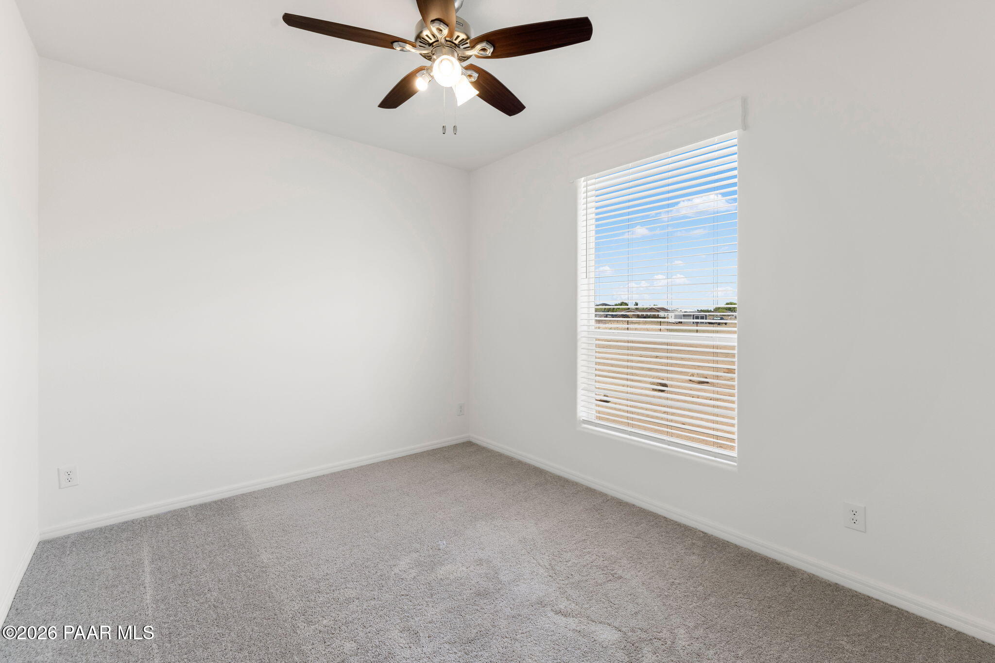 9905 East Ringold Road Dewey-Humboldt, AZ 86327 - Photo 15 of 20 an empty room with a window