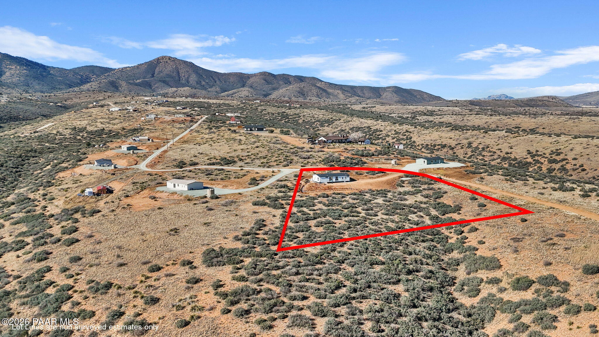9905 East Ringold Road Dewey-Humboldt, AZ 86327 - Photo 4 of 20 a view of a field with a mountain in the background