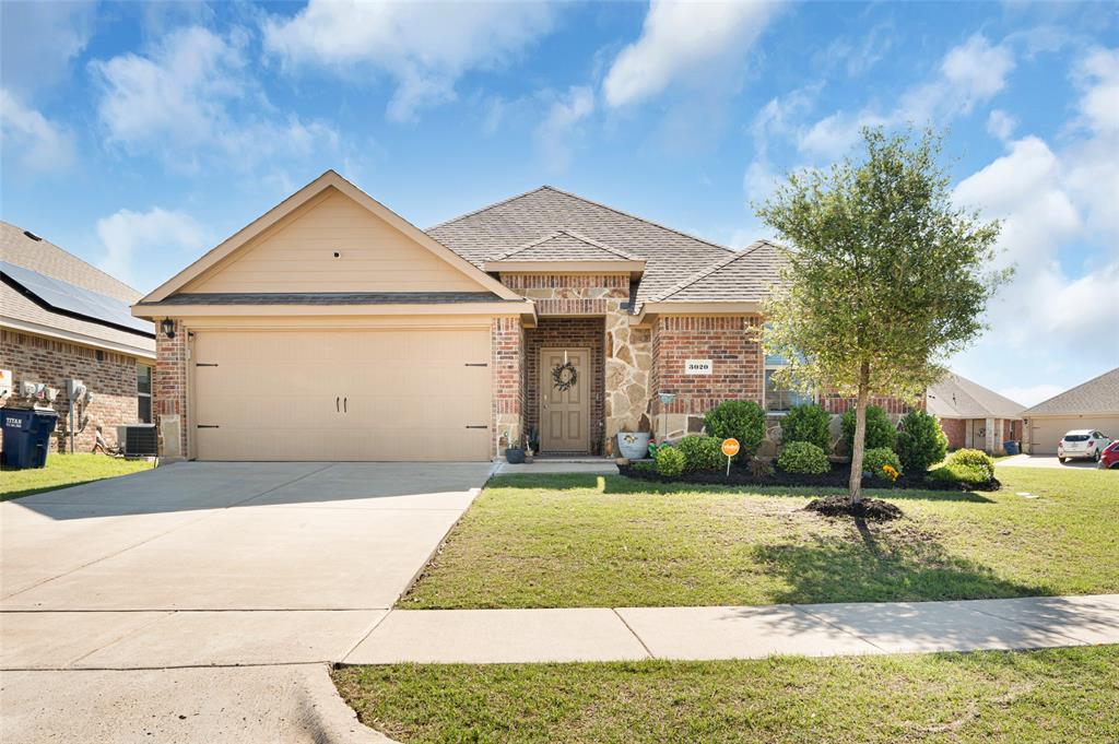 3020 Seth Lane Forney, TX 75126 - Photo 1 of 1 a front view of a house with garden