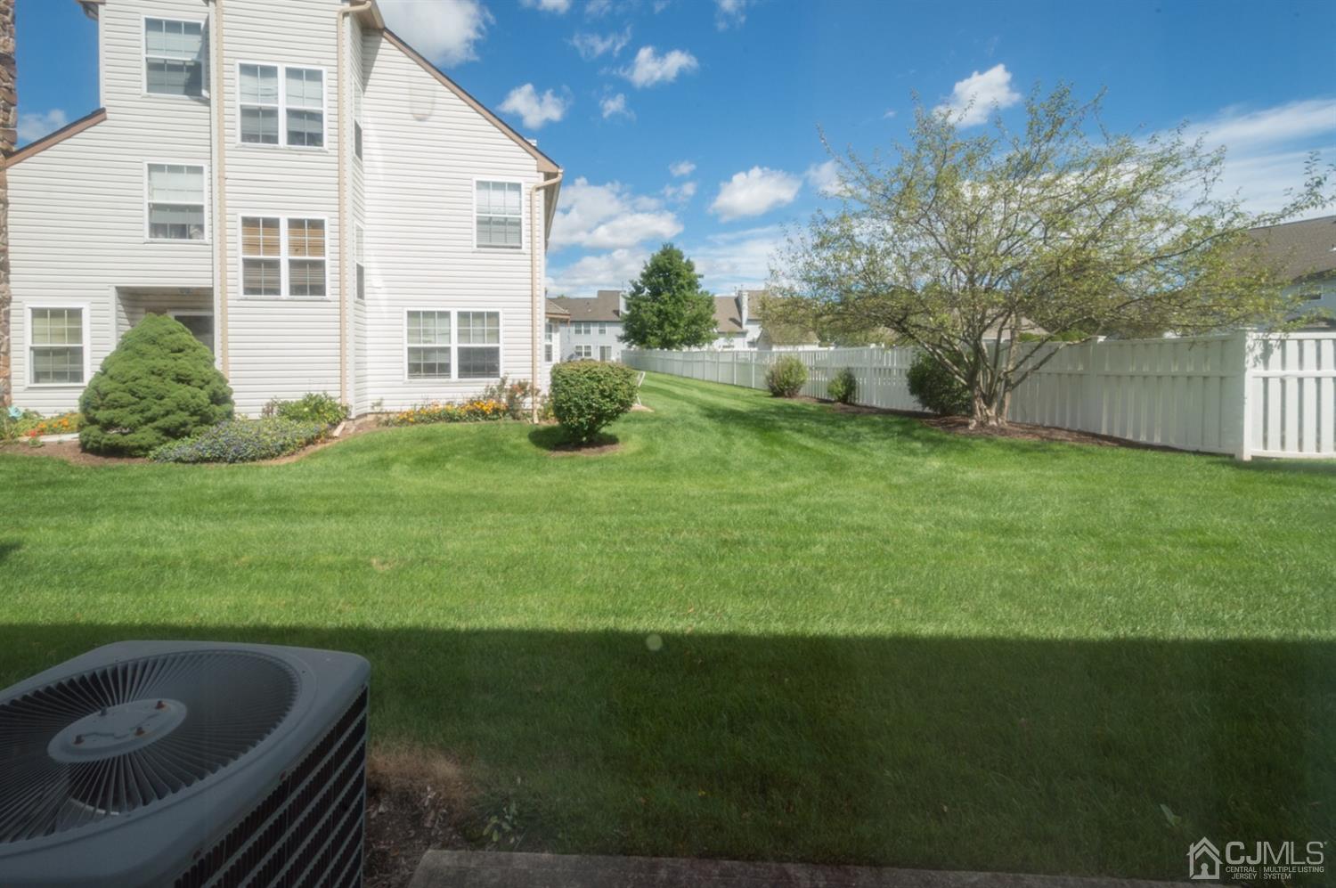 302 Pegasus Road Piscataway, NJ 08854 - Photo 23 of 27 a view of a house with a yard