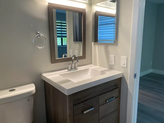 a bathroom with a sink and a toilet