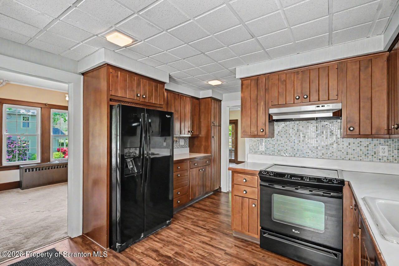 502 Layton Road Clarks Summit, PA 18411 - Photo 19 of 42 a kitchen with a stove and a refrigerator