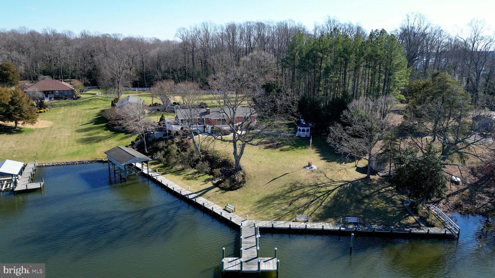 24991 Briscoe Road Hollywood, MD 20636 - Photo 12 of 130 a view of a lake with houses