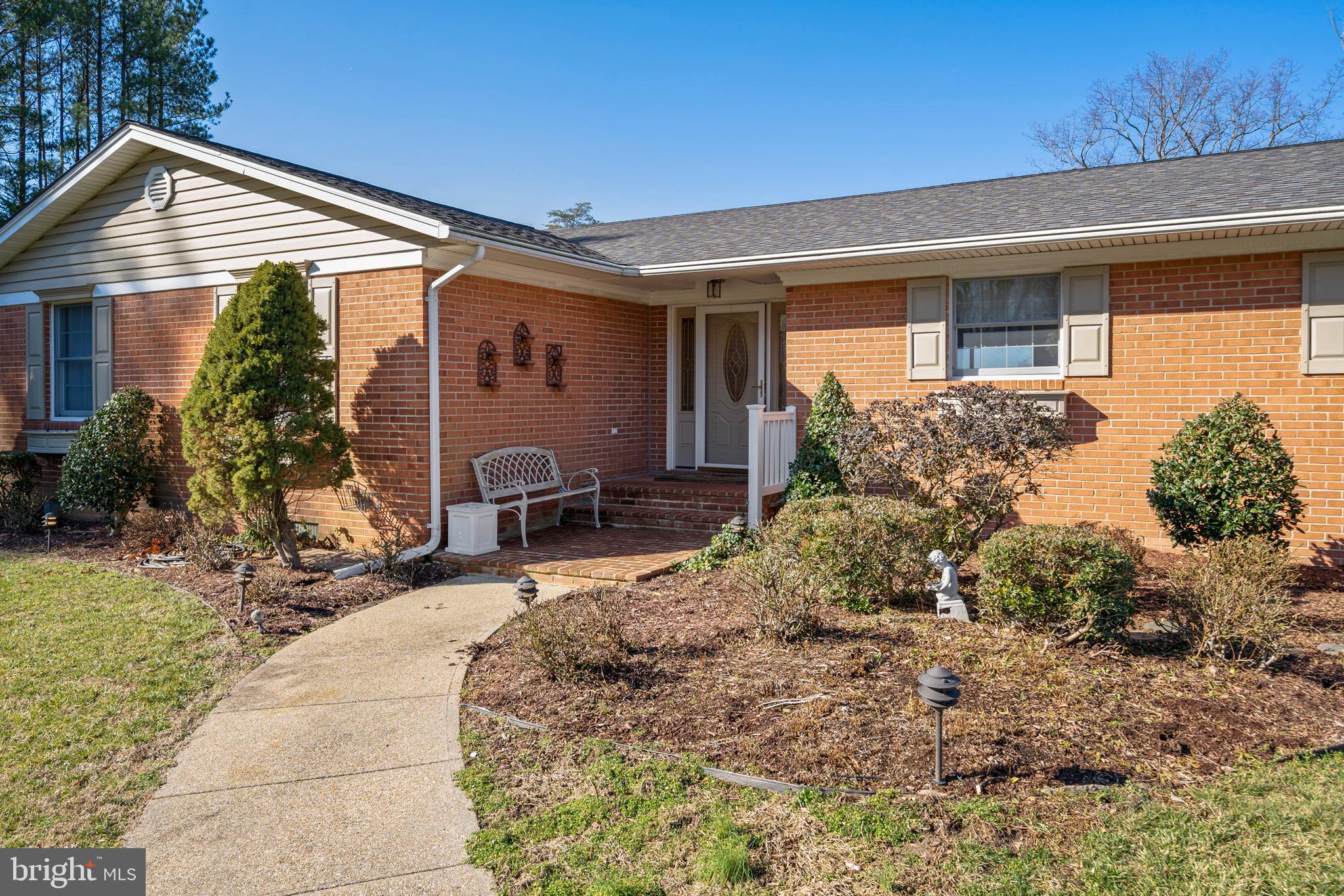 24991 Briscoe Road Hollywood, MD 20636 - Photo 36 of 130 a front view of house with yard