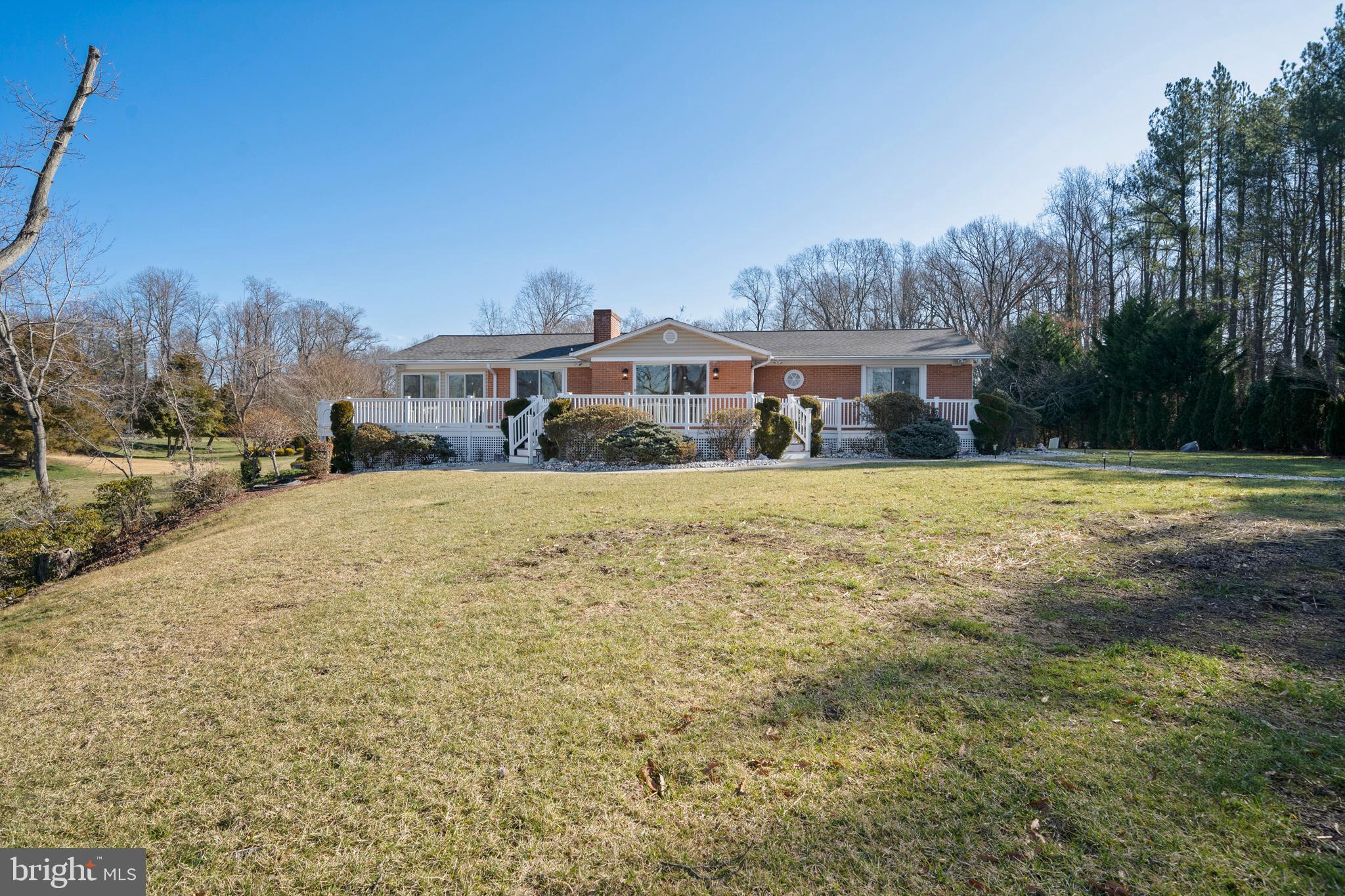 24991 Briscoe Road Hollywood, MD 20636 - Photo 43 of 130 a front view of a house with a yard