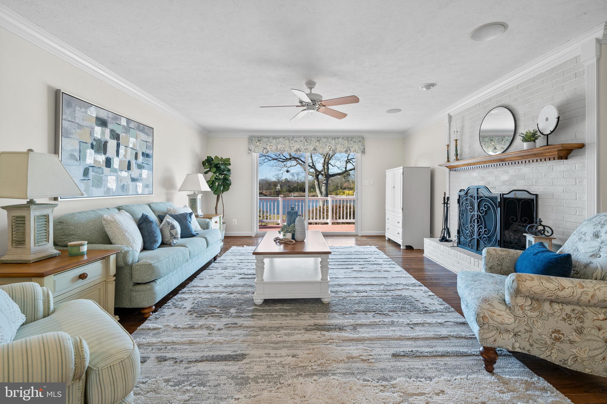 24991 Briscoe Road Hollywood, MD 20636 - Photo 68 of 130 a living room with fireplace furniture and a large window
