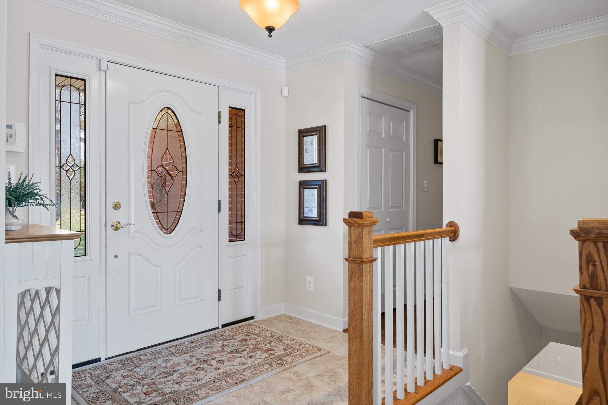 24991 Briscoe Road Hollywood, MD 20636 - Photo 73 of 130 a view of a hallway with entryway wooden floor and front door