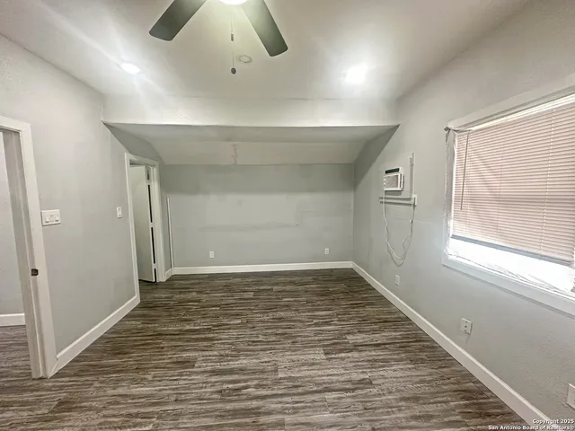 a bathroom with a bathtub and a sink