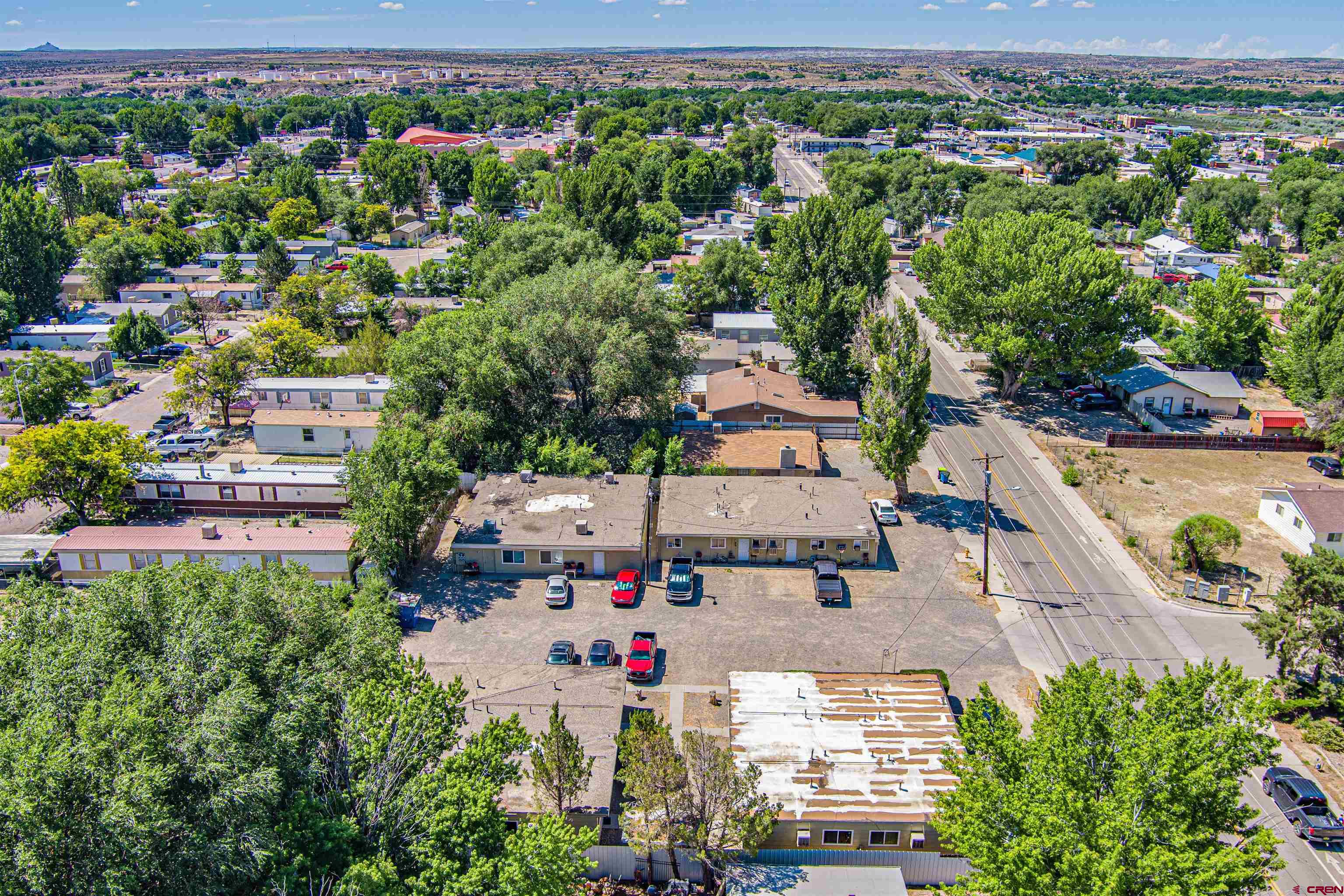 500 North 3rd Street Bloomfield, NM 87413 - Photo 15 of 33 an aerial view of a house with a yard