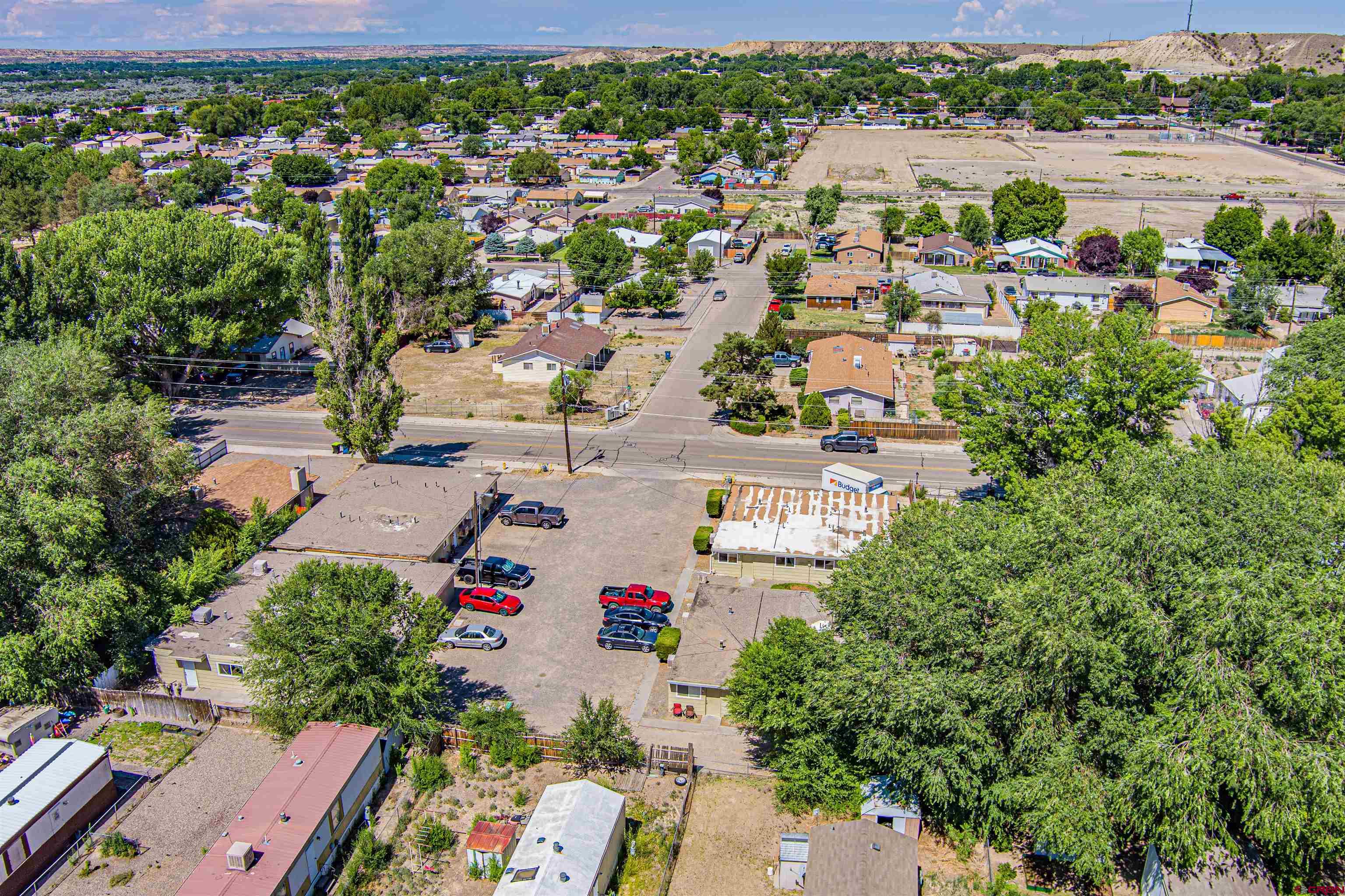 500 North 3rd Street Bloomfield, NM 87413 - Photo 16 of 33 an aerial view of a houses with a lake view