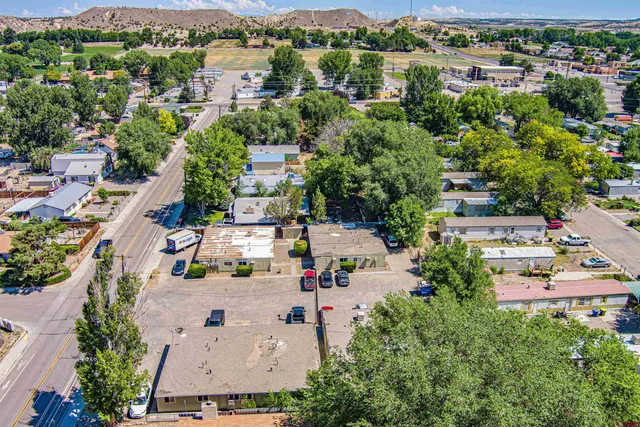 an aerial view of a city with lots of residential buildings