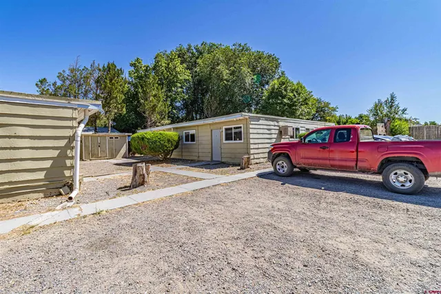 a car parked in front of a house