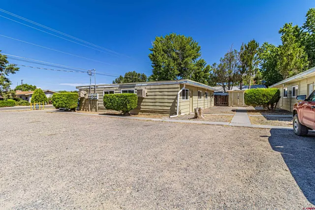 a view of street with parked cars