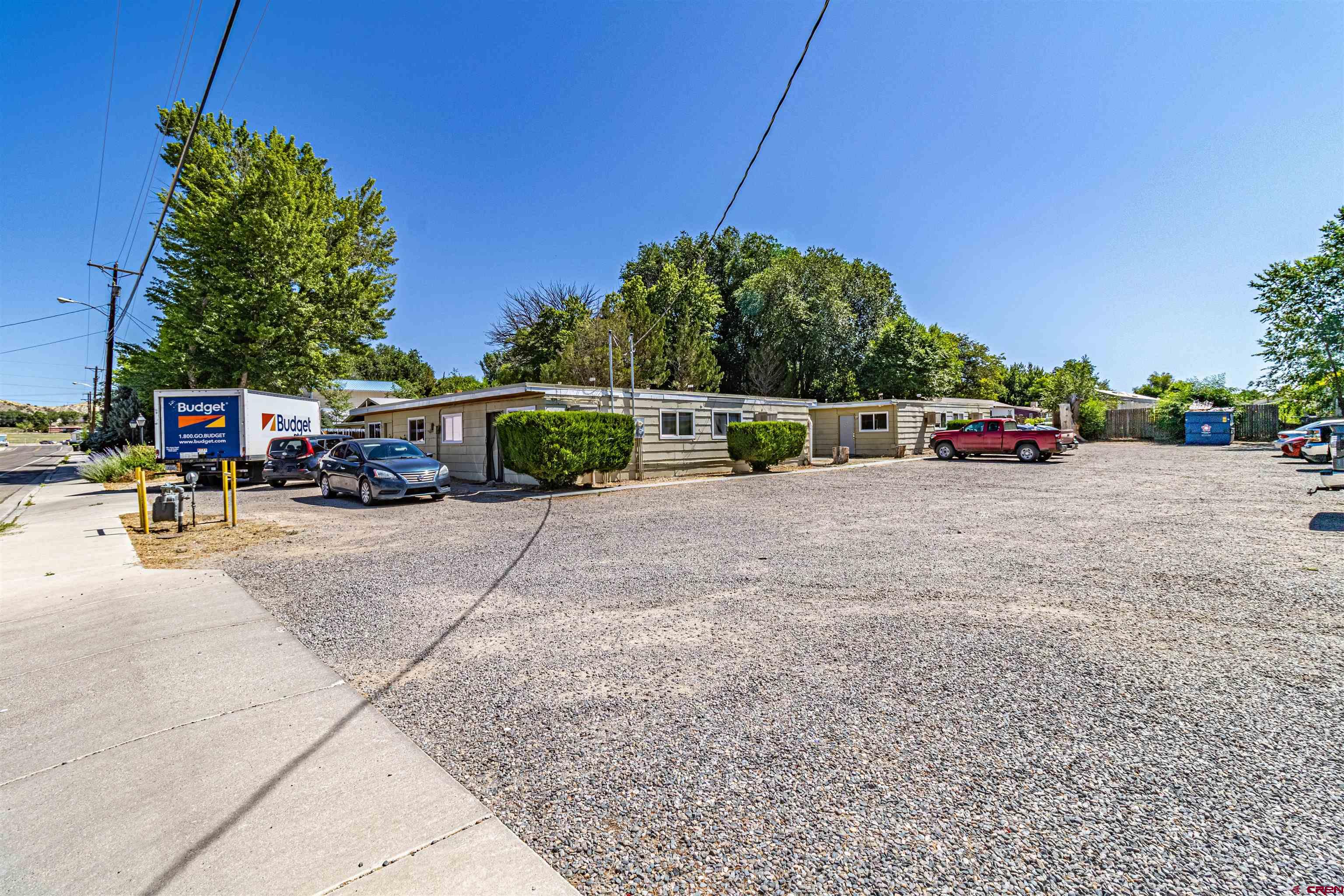 500 North 3rd Street Bloomfield, NM 87413 - Photo 31 of 33 a view of street with parked cars
