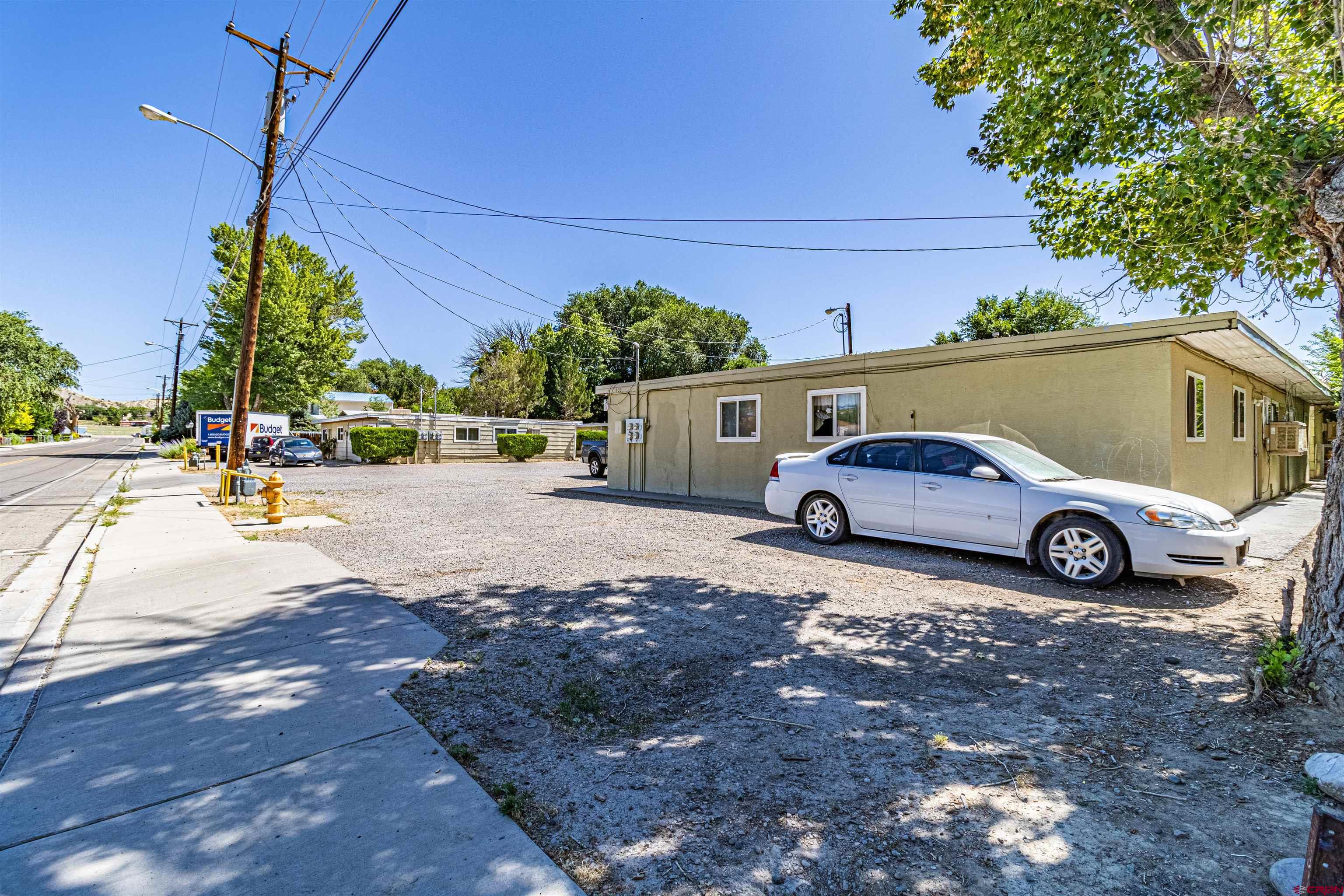 500 North 3rd Street Bloomfield, NM 87413 - Photo 32 of 33 a view of a cars parked in front of a house