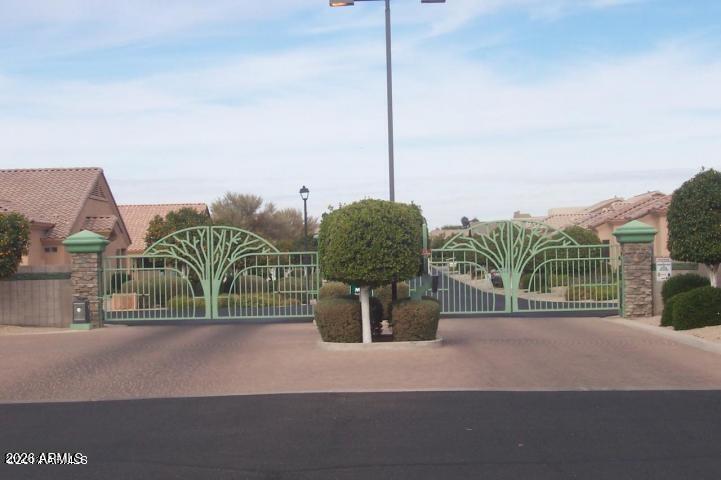 4202 East Broadway Road, Unit 80 Mesa, AZ 85206 - Photo 38 of 68 a front view of a house with a garden and plants