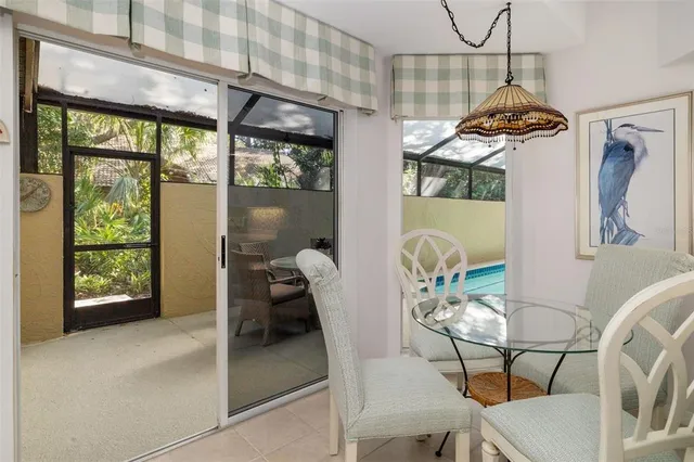 a bath room with a sink and a mirror