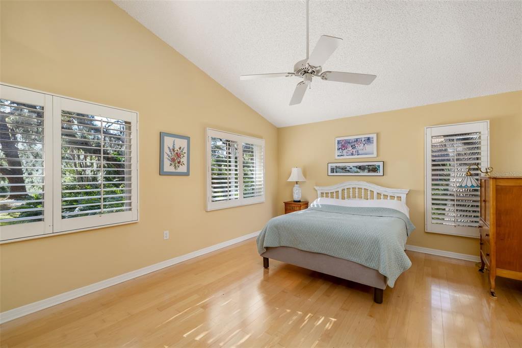 4480 Ascot Circle South Sarasota, FL 34235 - Photo 17 of 76 a bedroom with a bed and a window