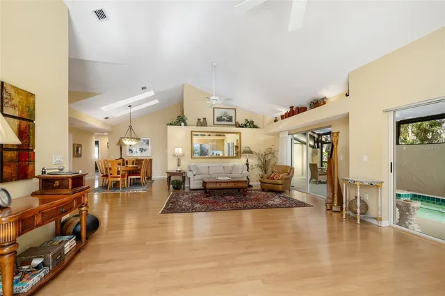 a living room with furniture and a rug