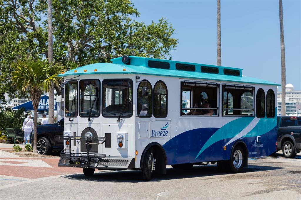 4480 Ascot Circle South Sarasota, FL 34235 - Photo 67 of 76 a car parked in front of a store