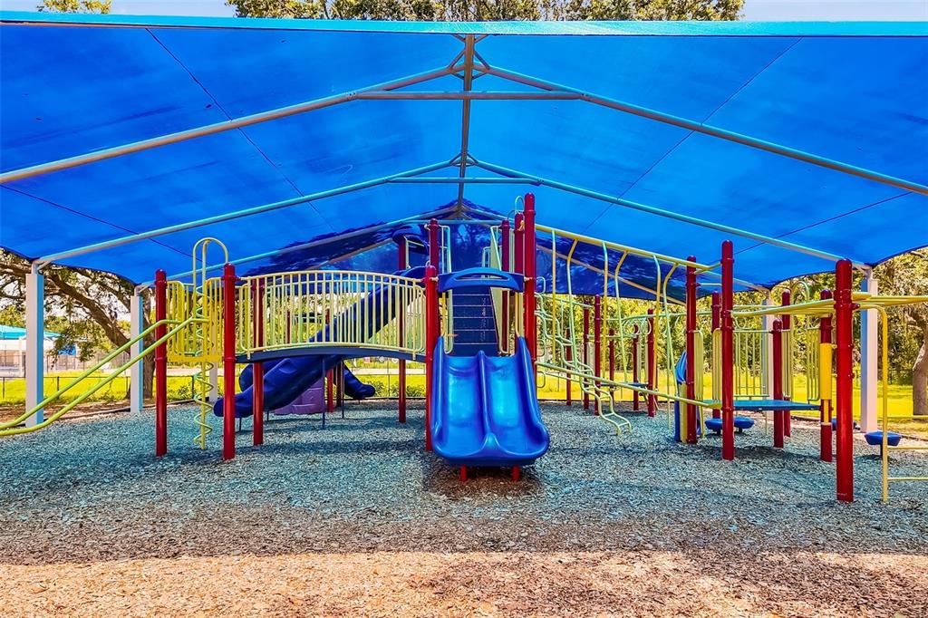 4480 Ascot Circle South Sarasota, FL 34235 - Photo 72 of 76 a view of a park with slide