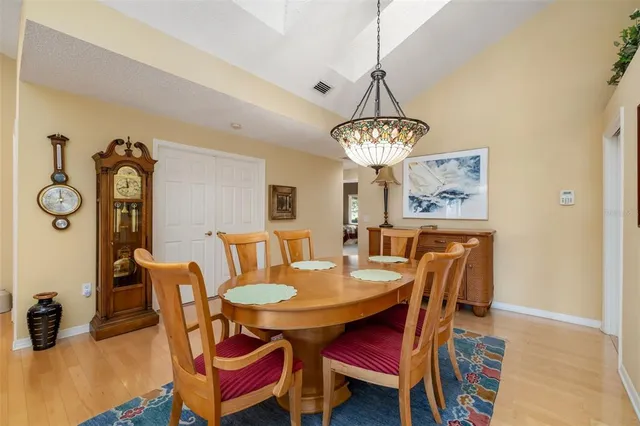 a kitchen with a sink appliances and cabinets