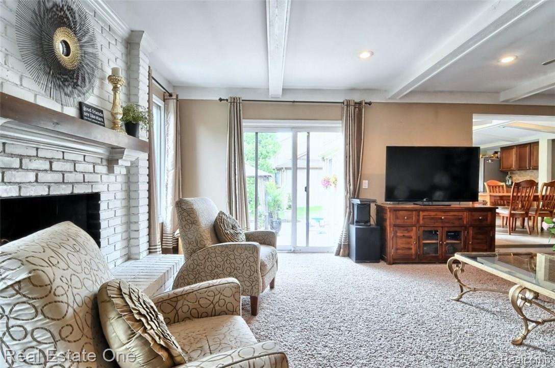 1836 Jason Circle Rochester, MI 48306 - Photo 21 of 45 Family Room offers recessed lighting and decorative ceiling beams!