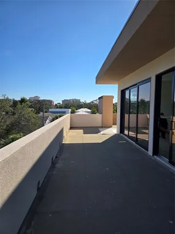 a terrace with a bench