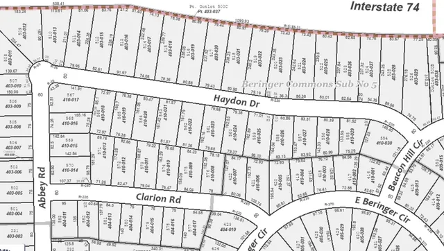 a black white and white photo of a black gate