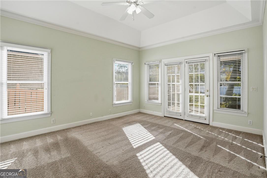 171 West Commons Drive St. Simons, GA 31522 - Photo 16 of 39 a view of an empty room with a window