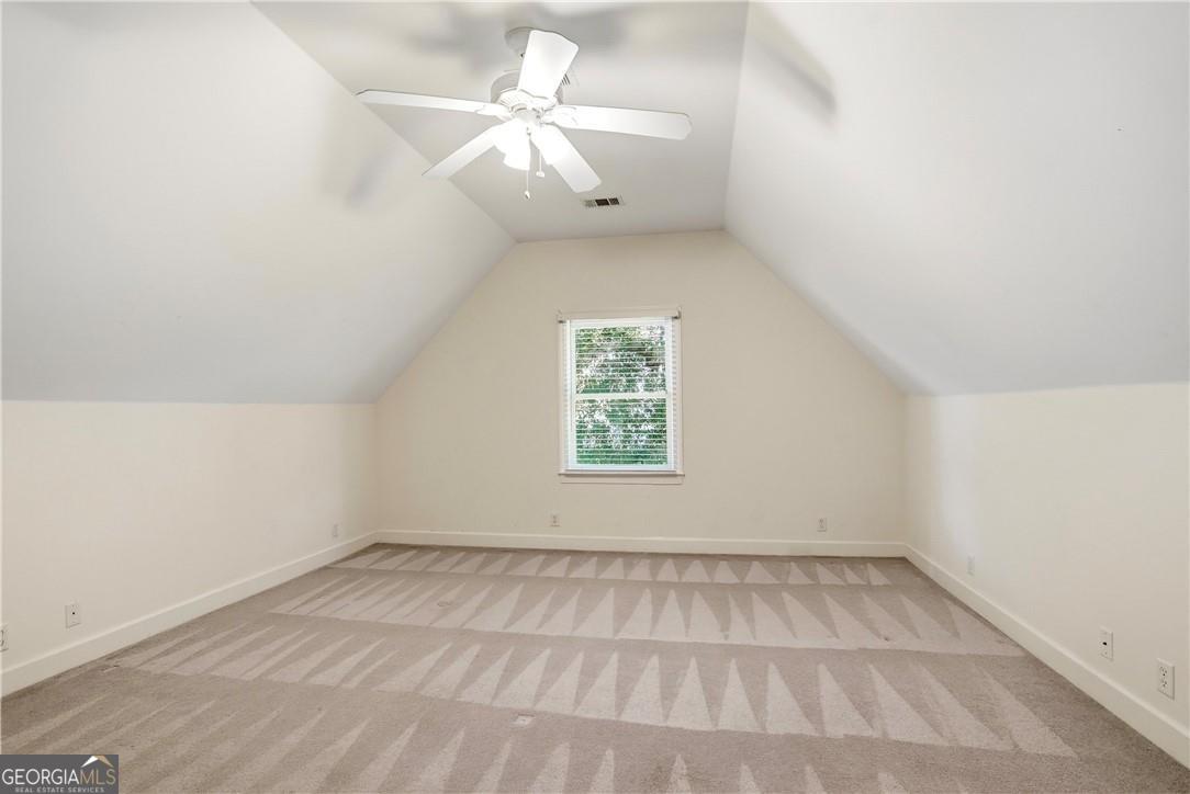 171 West Commons Drive St. Simons, GA 31522 - Photo 28 of 39 an empty room with a window