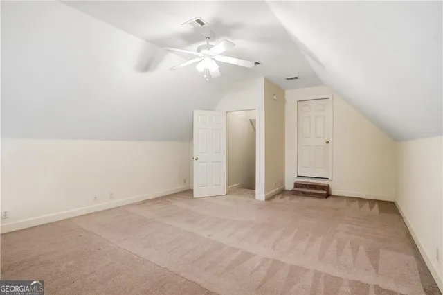 an empty room with a bathroom