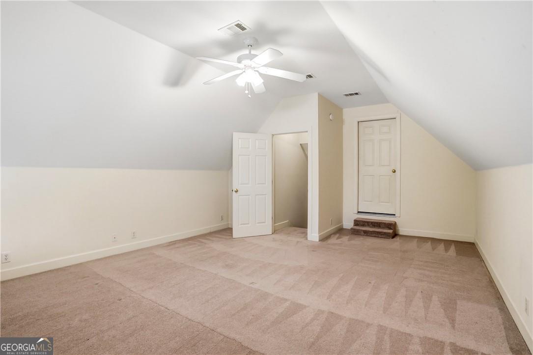 171 West Commons Drive St. Simons, GA 31522 - Photo 29 of 39 an empty room with a bathroom