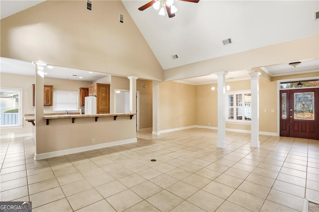 171 West Commons Drive St. Simons, GA 31522 - Photo 9 of 39 a view of an empty room and a window