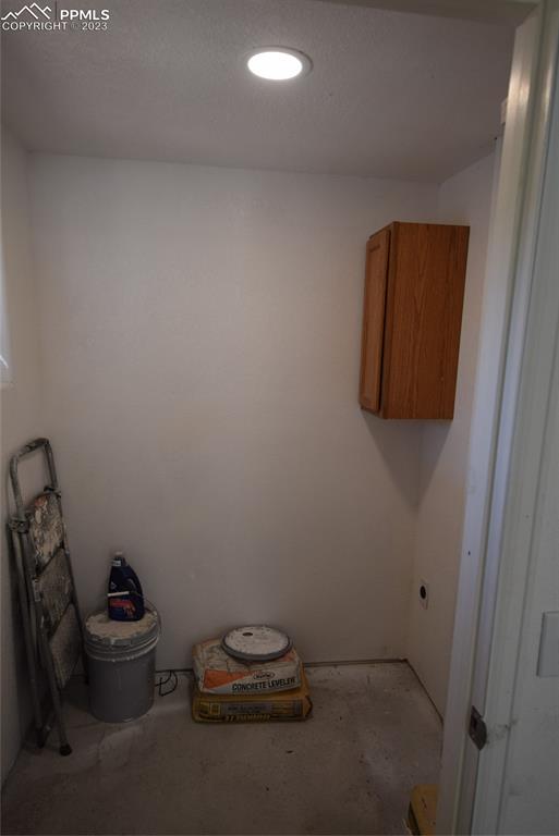 17618 Highway 67 Divide, CO 80814 - Photo 25 of 45 a room with a mirror and racks on the wall