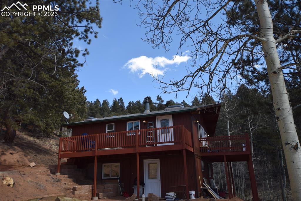 17618 Highway 67 Divide, CO 80814 - Photo 36 of 45 a view of a house with a roof deck